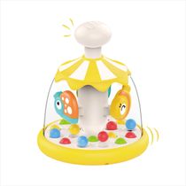 Chocalho de apertar com bolinhas